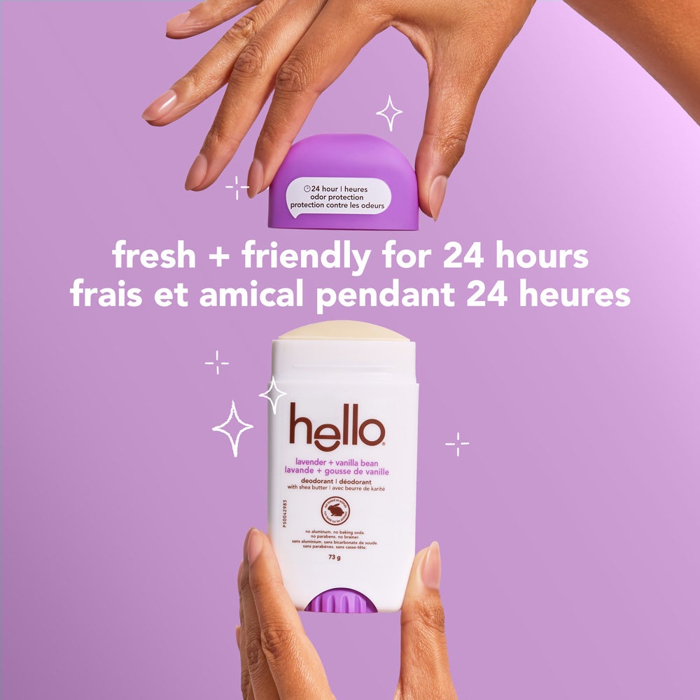 A white bottle of Hello Lavender + Vanilla Bean deodorant. The bottle has blue and green lettering and states "24 hour odor protection," "fresh + friendly for 24 hours," "with shea butter," "no aluminum," "no baking soda," "no parabens," and "no brainer" in both English and French. The image also includes the words "lavender + vanilla bean."