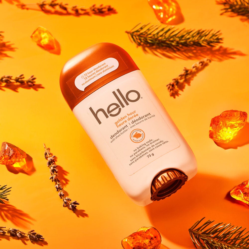 hello golden hour aluminum free deodorant for Women and Men surrounded by warm golden scent inspiration, chunks of amber and sprigs of fir.