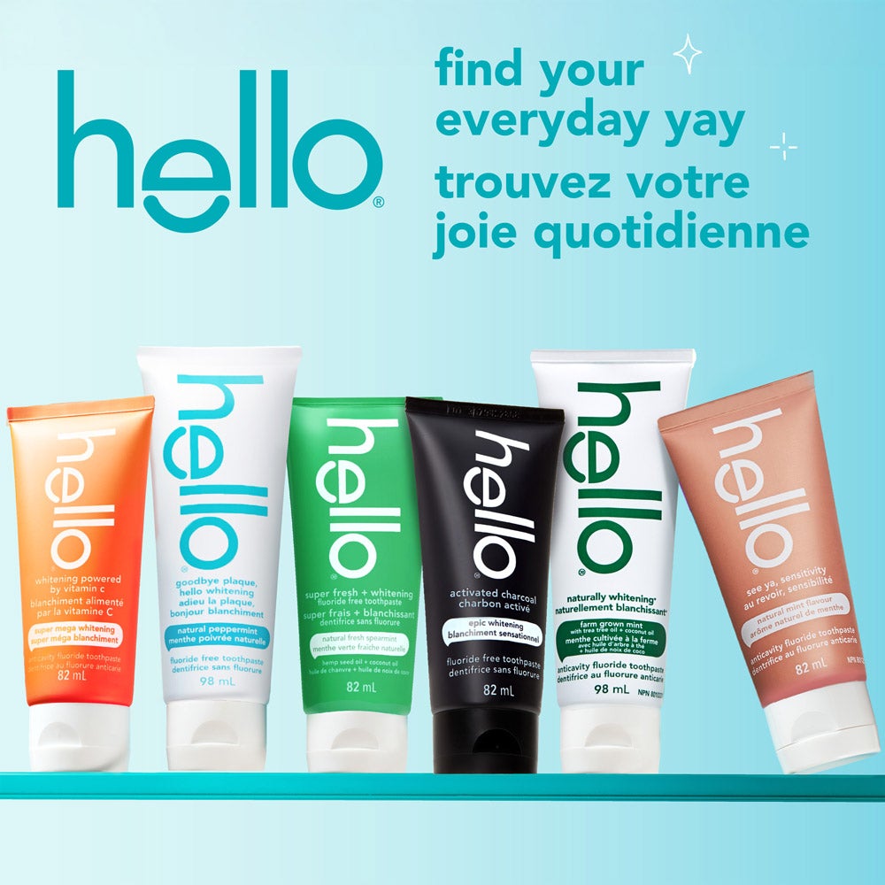 A row of five hello brand toothpaste tubes in different colors and varieties, standing upright on a turquoise surface with a turquoise background. The text above the tubes reads &quot;find your everyday yay&quot; in English and French. The hello logo appears in the top left corner.