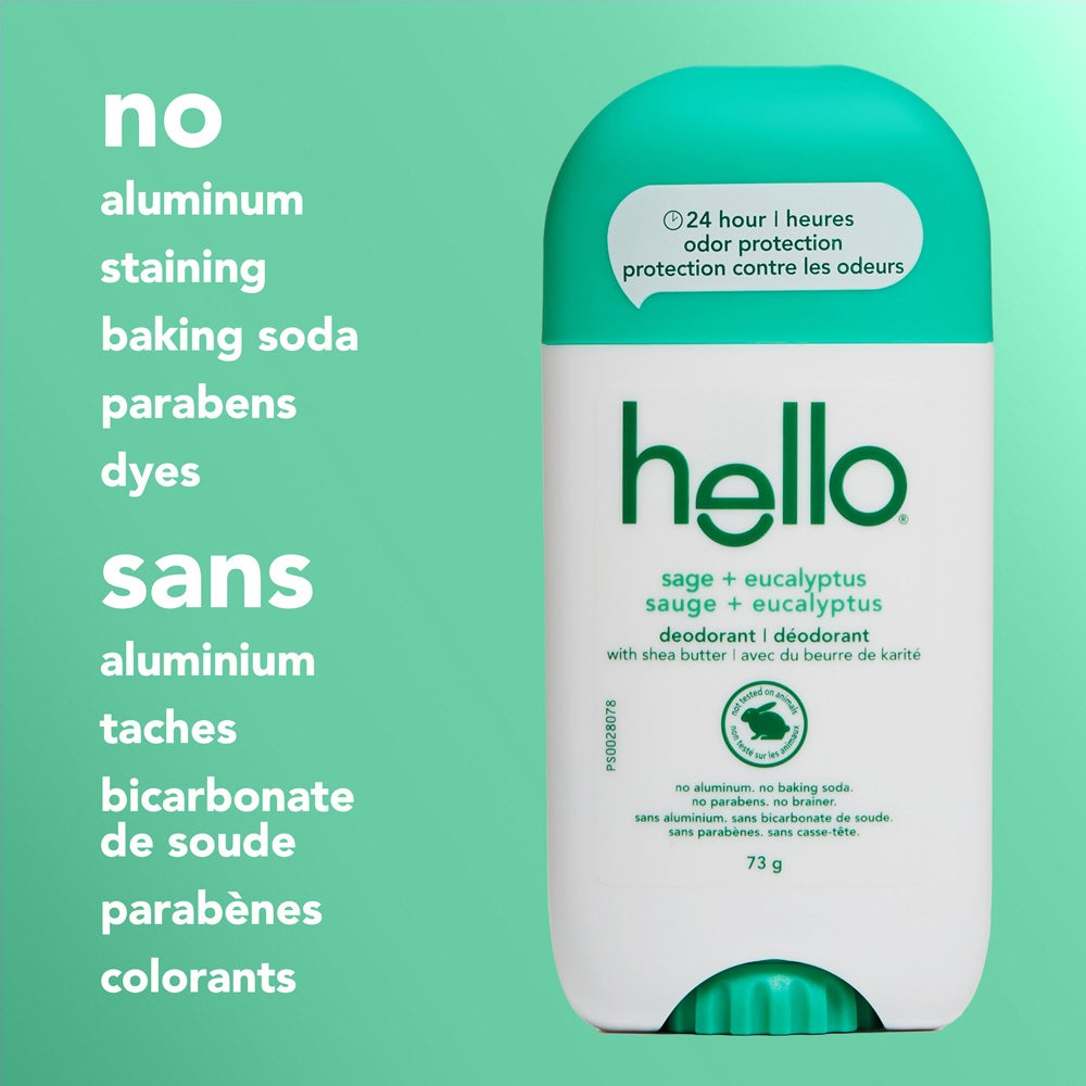A close-up of a hello Sage + Eucalyptus deodorant stick with a green cap, standing upright on a green background. The image features text listing product attributes: "no aluminum, staining, baking soda, parabens, dyes."