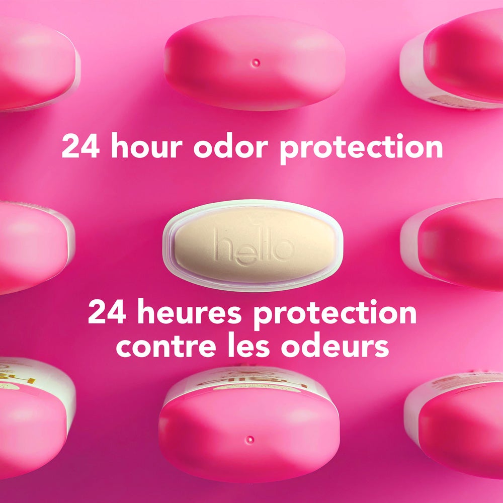 Vue de dessus de plusieurs contenants de déodorant rose disposés autour d’un contenant ovale central jaune-vert embossé du mot « hello ». L’image inclut le texte « sans aluminium ».