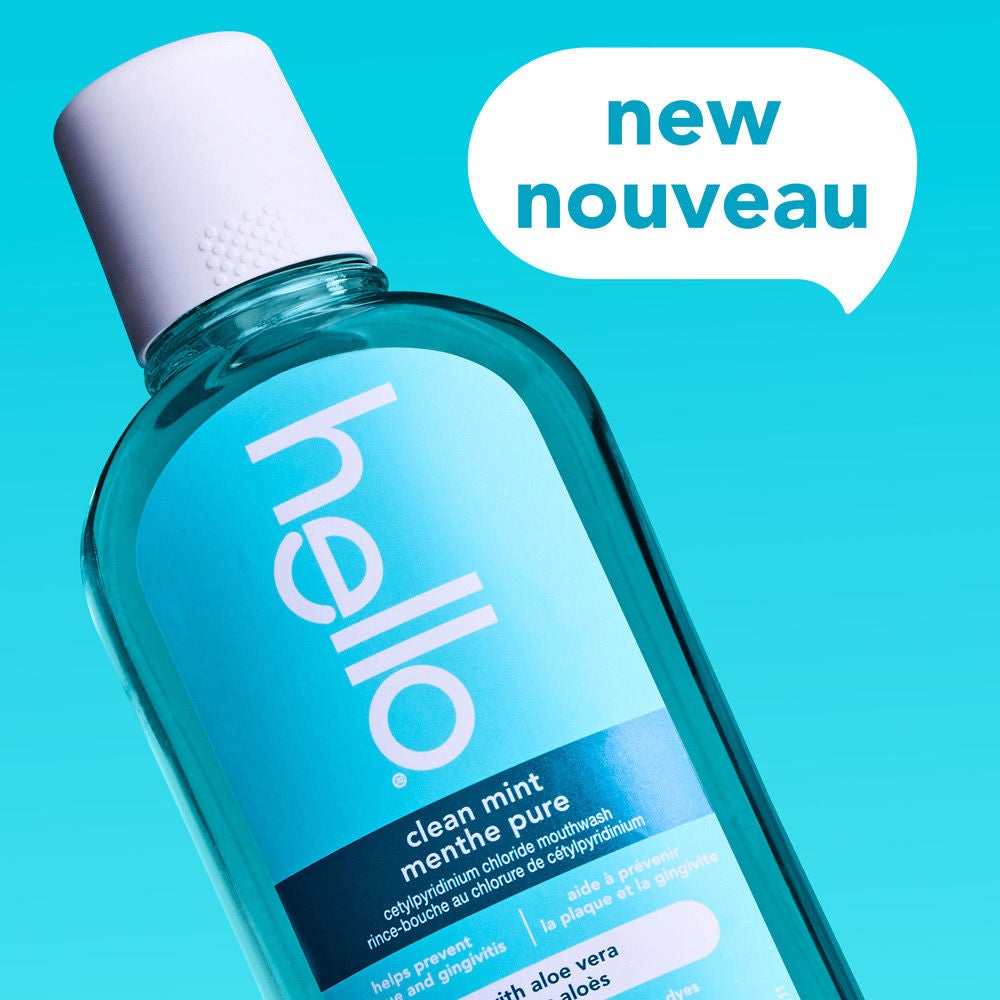 Close-up of the hello Clean Mint Alcohol Free Mouthwash bottle with a speech bubble displaying the word “New.”