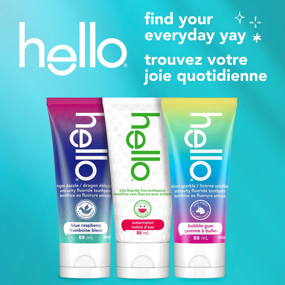 Three tubes of Hello toothpaste are displayed upright against a blue background. The flavors shown are dragon dazzle blue raspberry, watermelon, and unicorn bubble gum. The text in the top right corner says, &quot;find your everyday yay.&quot;